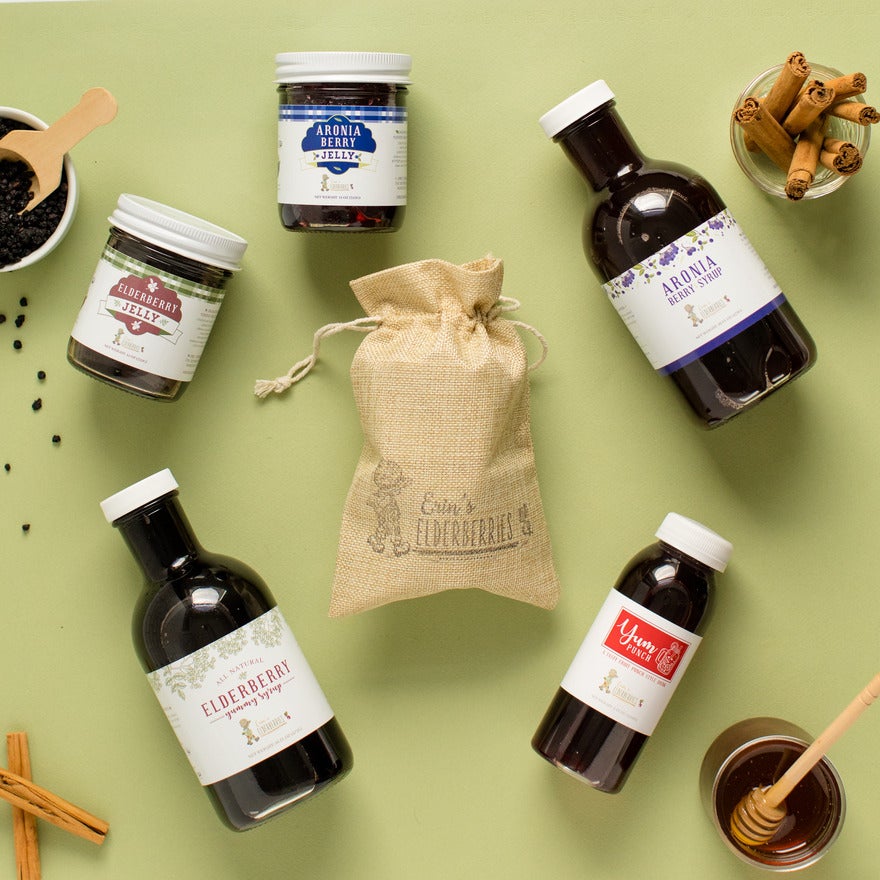 Erin's Elderberries product photos Green background with assortment of products from Erin's Elderberries