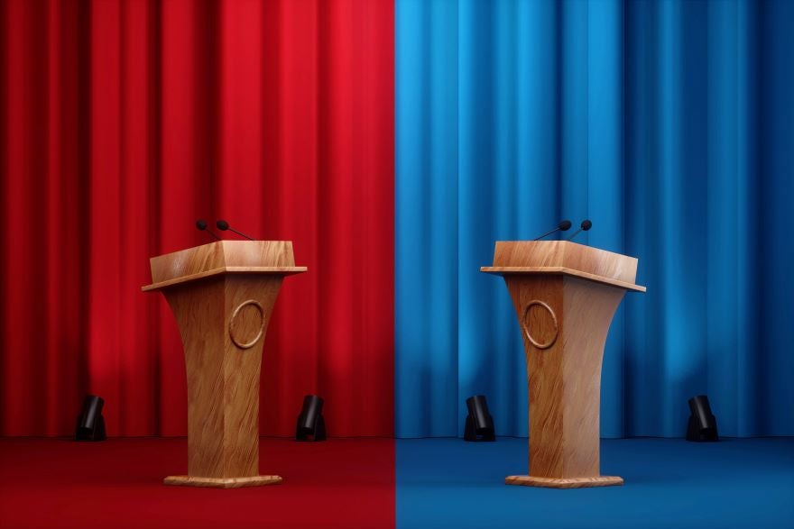 Google Politics News Photo of a red and blue curtain with a podium on each side