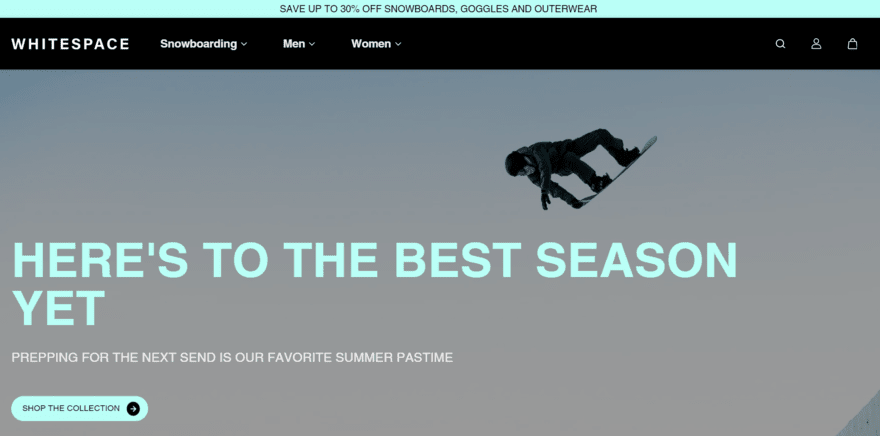 Whitespace WHITESPACE homepage showing a snowboarder jumping through the air with a button below to "shop the collection"