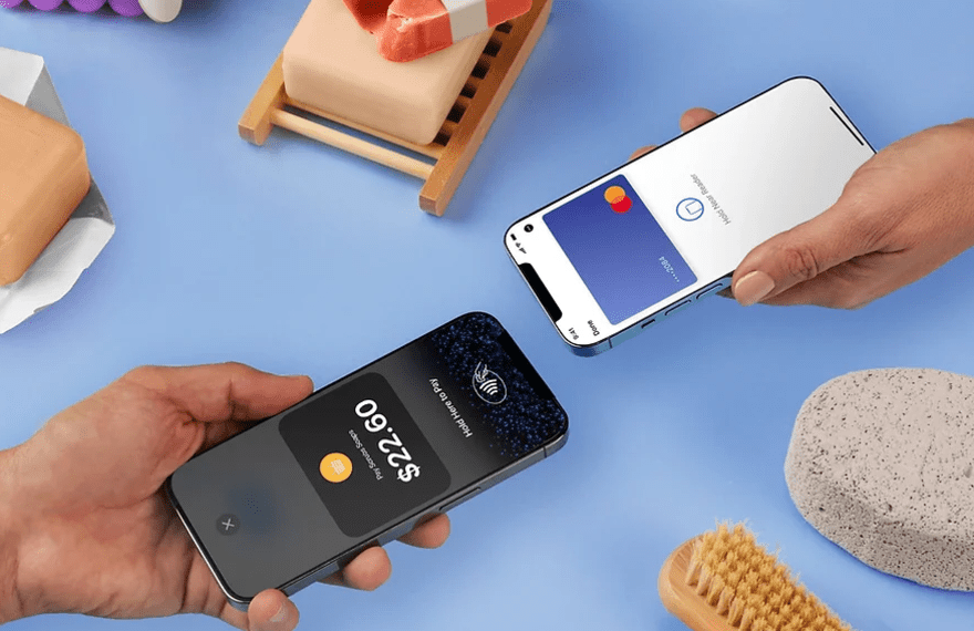 Wix Tap to Pay on iPhone Two hands holding two phones together for a contactless payment